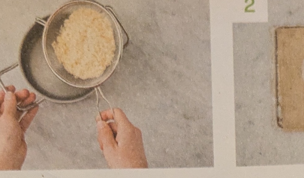 Step: Reis in einem Sieb mit kaltem Wasser so lange...